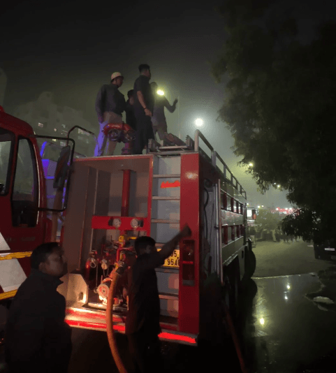 Fire Fighters Controls a fire at showroom