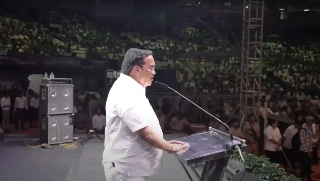 Green Vehicle Policy : C. R. Patil addressing a large public gathering during the Surat Municipal Corporation event.